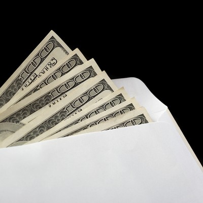 White Envelope Containing Money