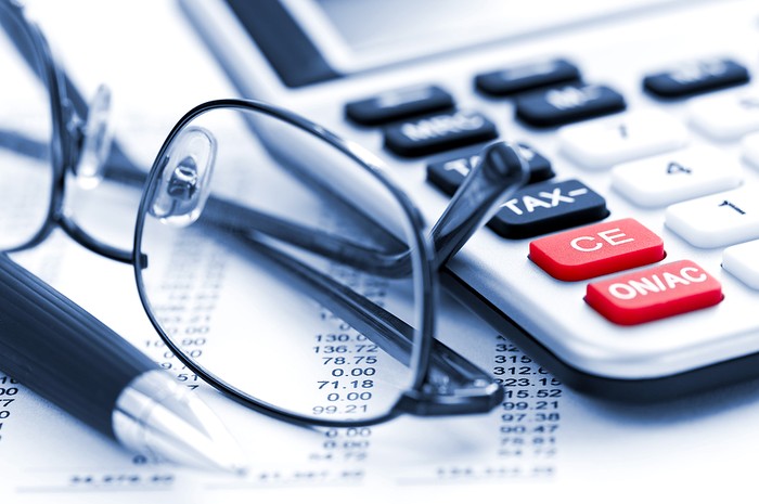 Calculator with Pen and Glasses