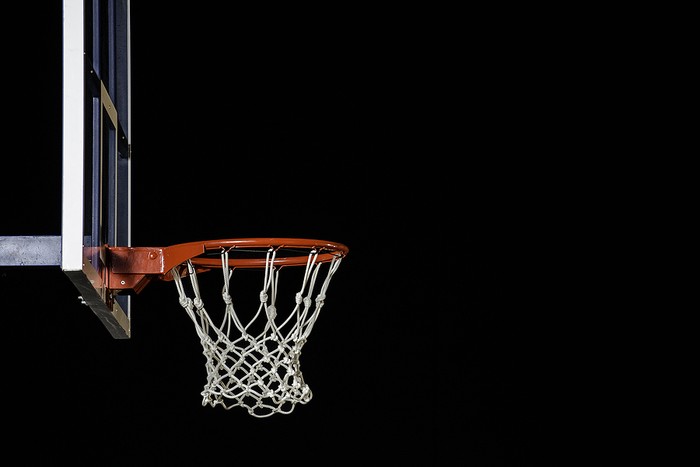 Basketball Hoop Against Dark Background