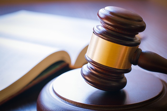 Gavel Close Up with Legal Book