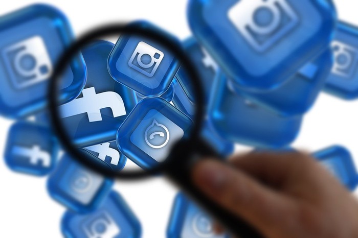 Social Media Icons Under Magnifying Glass