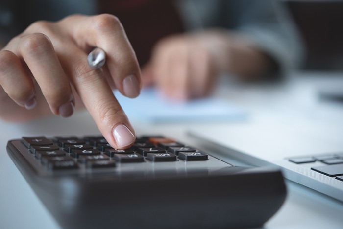Accountant Using Calculator Close Up