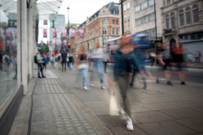 Motion Blurred Shoppers on High Street