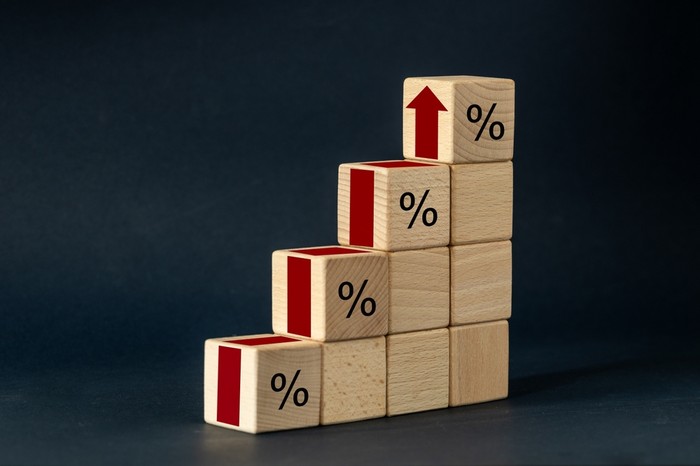 Percentage Wooden Blocks with Red Arrow