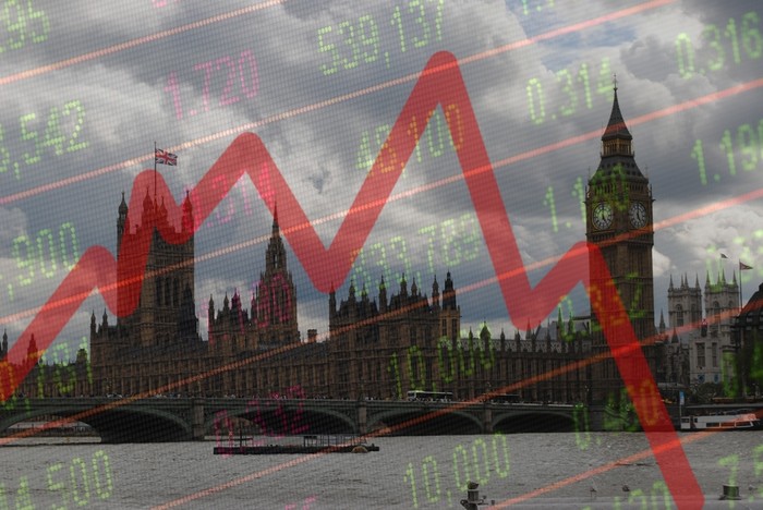 Stock Market Decline Chart Against Houses of Parliament