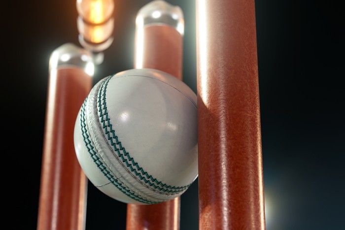 White Cricket Ball Hitting Wickets