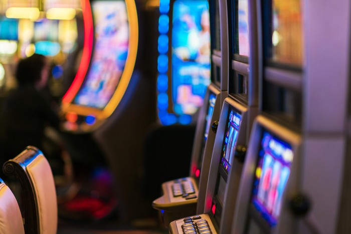 Row of Slot Machines in Gaming Centre